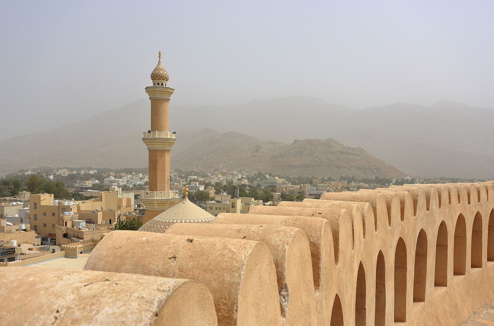 Nizwa Fort and the minaret of the Friday mosque