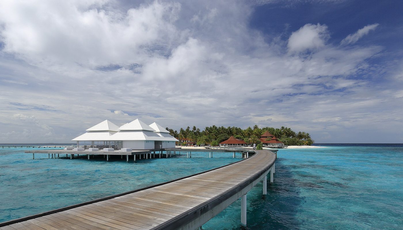 Water villas and jetty on a Maldives resort island